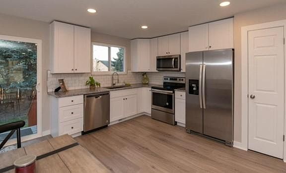 Walk out onto the new Trex deck from the kitchen.