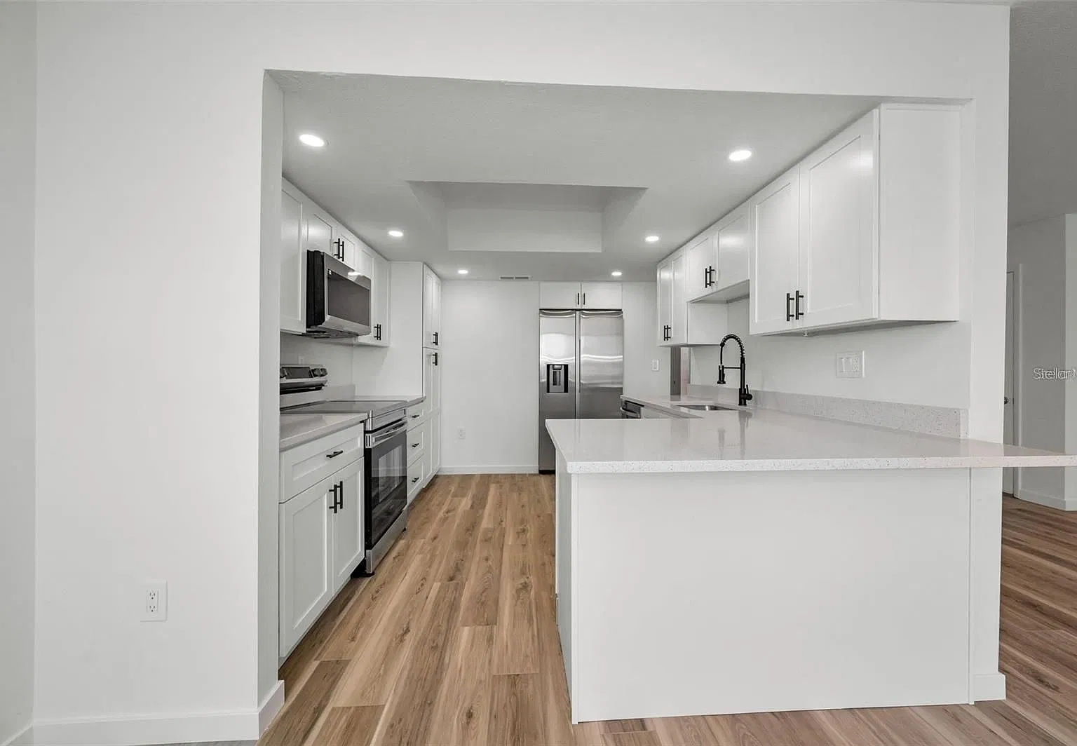 Fully updated 55+ Condo. 2 bed, 2 bath with covered parking — Photo 1