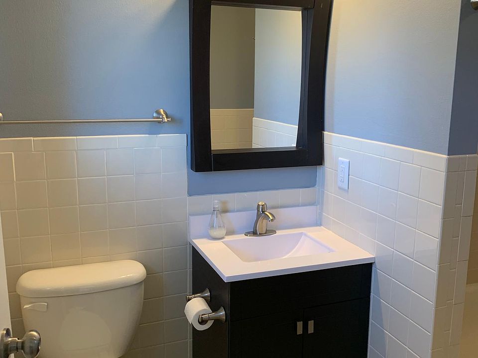 Main bath - walk thru to bedrooms from kitchen. New tile.