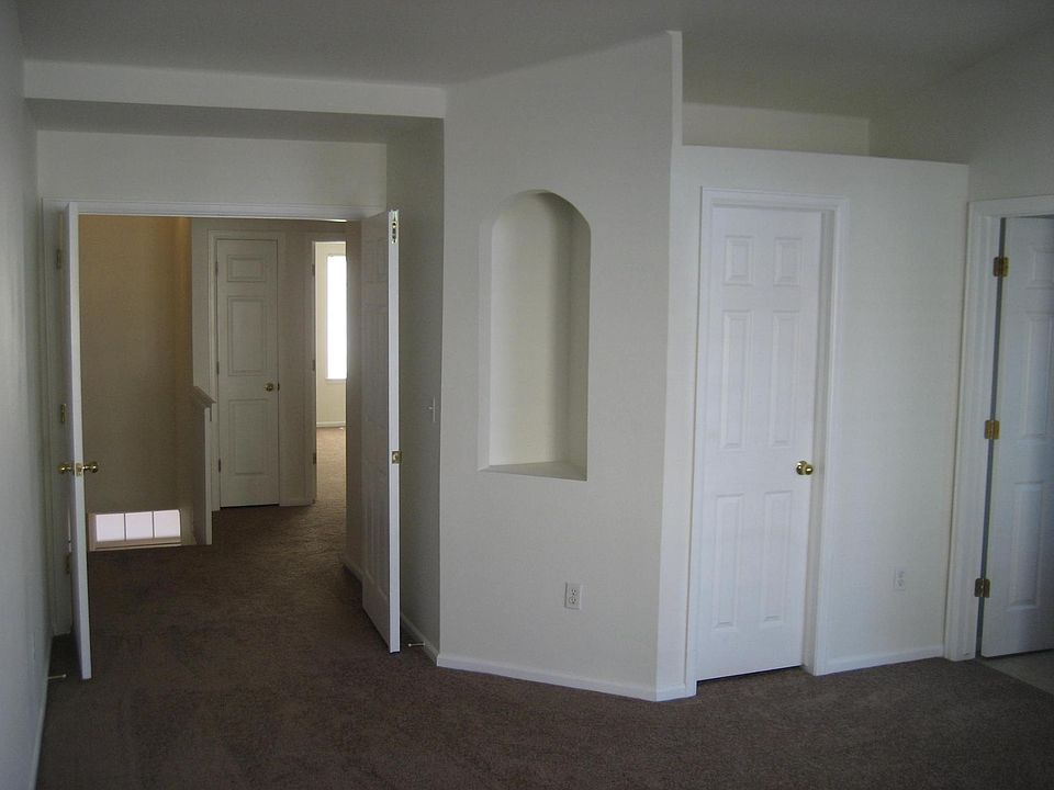 French doors in master suite with art nook.