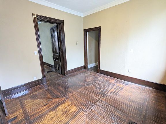 2nd image of 214 W 12th St Suite 1