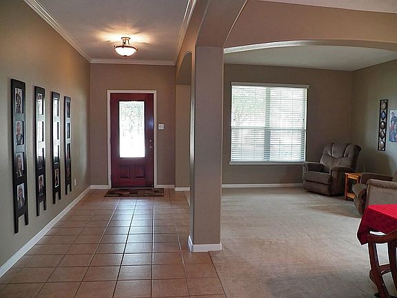 Entry hall with formal living/dining combo to the right