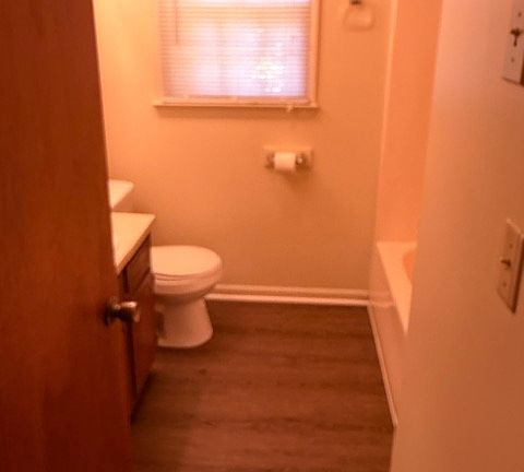 Bathroom has inlaid flooring