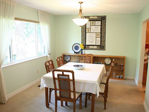 Candlelight and wine dinners can yours inthe formal dining room