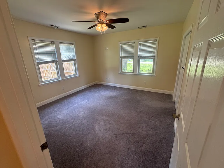 Second bedroom _ Second bedroom with closet and ceiling fan