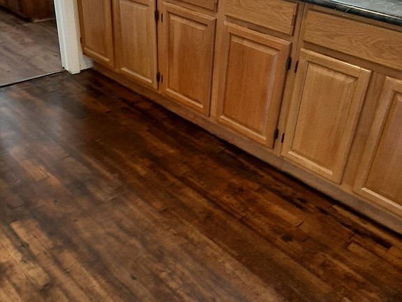 kitchen, with bathroom through doorway