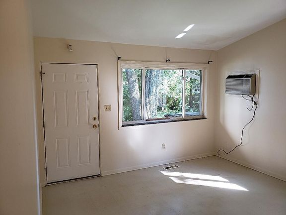 Air conditioning provided. Cable tv in all rooms . This is picture of living room.