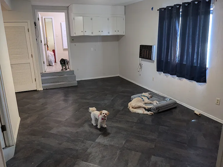 Reverse View of Den (from Garage Entry) towards laundry room and then kitchen
