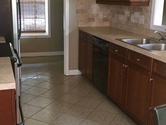 Kitchen with tiled floor