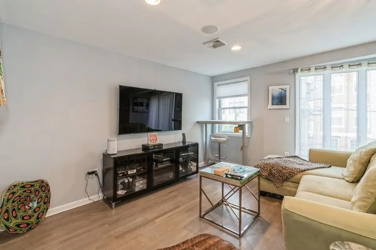 Jersey City Homes For Sale- 319 1st St #108 Finally, a large townhome style  condo with outdoor space and garage parking comes to market in the  Hudson NJ 07047 230016440