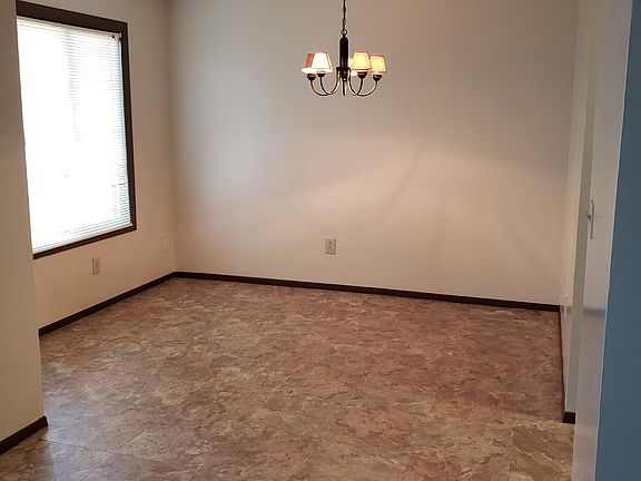 Dining room next to living room and kitchen