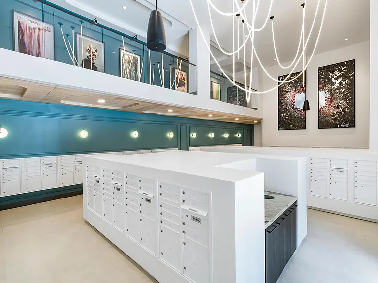 Mailroom with modern design complete with package lockers.