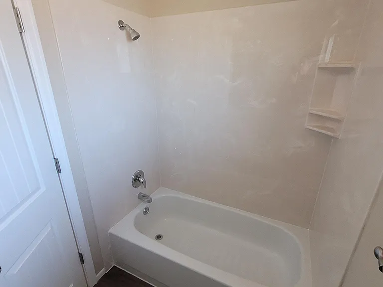 New Manstone tub surround