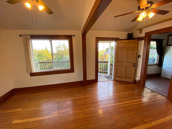 Front door opens to living room that connects to kitchen