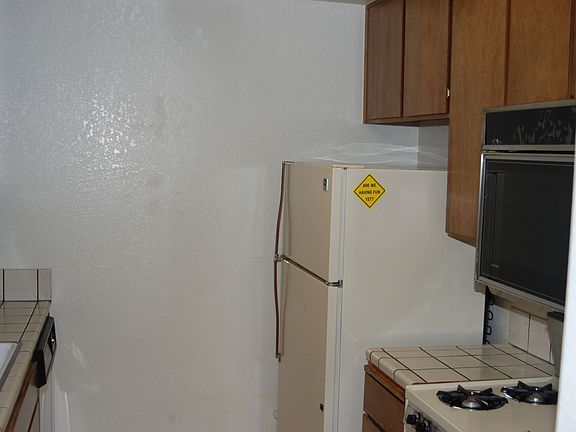 frig side of kitchen