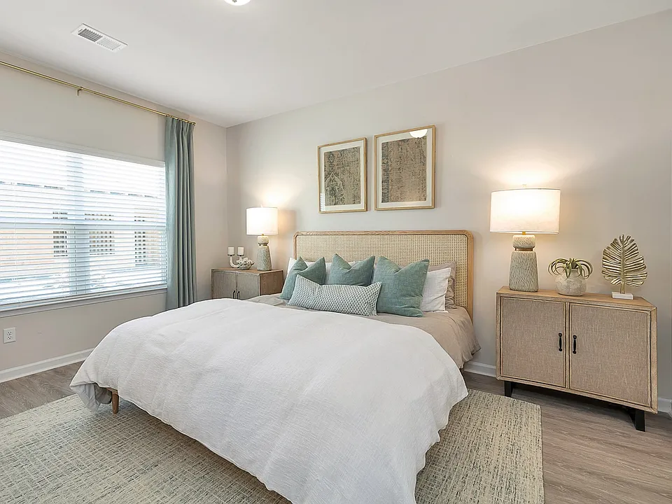 Large Bedrooms with Wood-style flooring