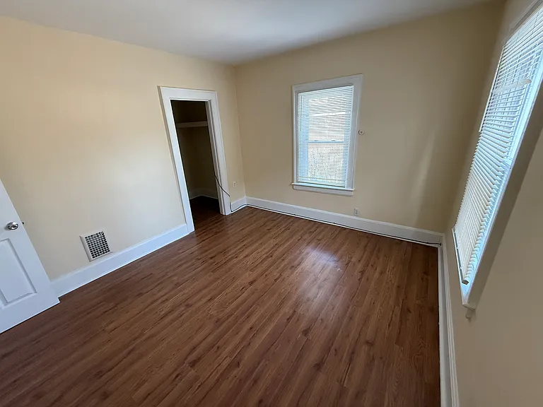 Another view of the upstairs front bedroom with closet.