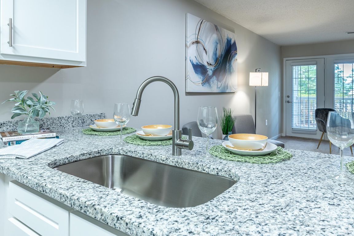 Kitchen with granite counters and stainless finishes