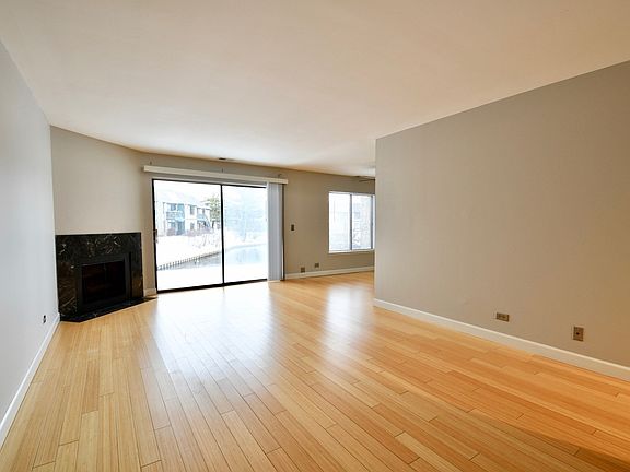 Spacious and Bright Living Room with Bamboo flooring.