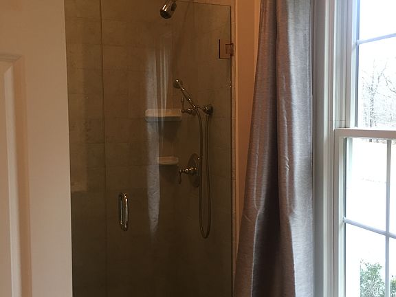 Stand up shower, ensuite private bathroom with window. Rooster and chickens live near by.