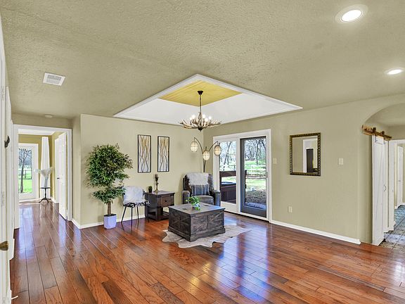 Small seating area with 2 chairs.