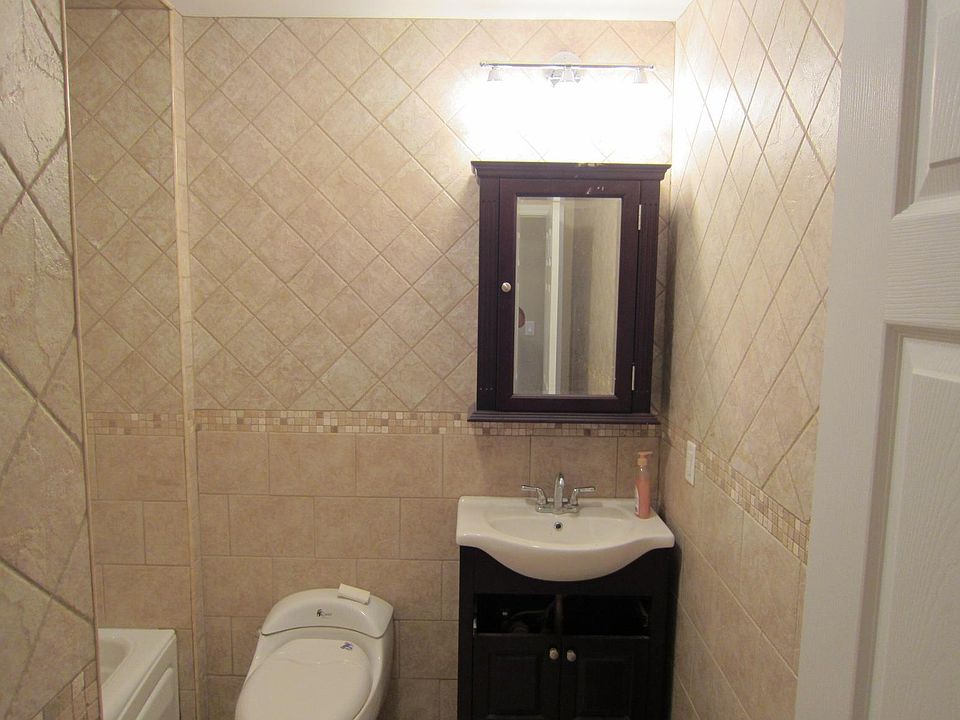 Fully tiled bathroom