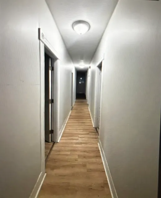 Central hallway to bedrooms, kitchen and baths