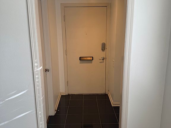 Entry way is tiled and a nice transition versus just walking into a living room which is customary.