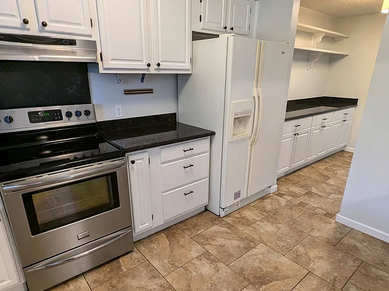 7935 Dartmoor Dr — Photo 4