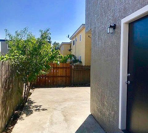 Front Door to unit with backyard