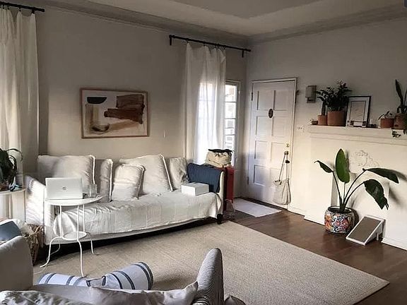 High ceilings, hardwood floors, tons of character!