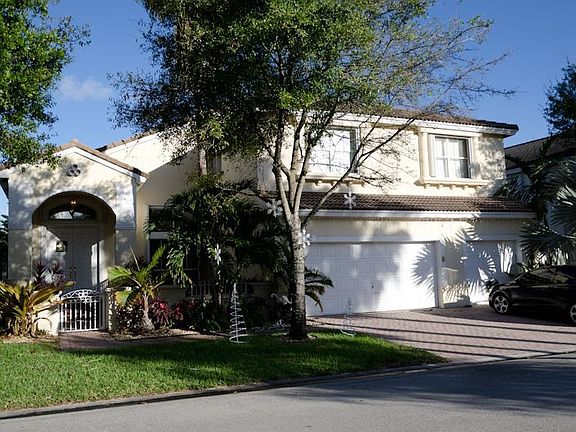 3 Car Garage, covered entry