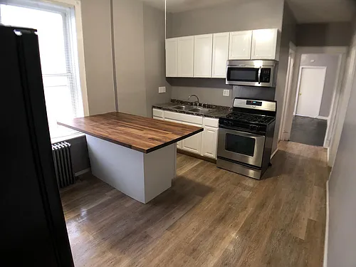1237 S 51st Ave #2F Photo 1
