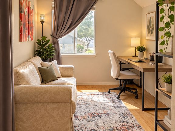Bonus room that can be used as a home office or a second bedroom. Note that it doesn't have the fourth wall, just the curtain, but it does have a closet, bookshelf and a 2-seater sofa that can either stay or be taken out.