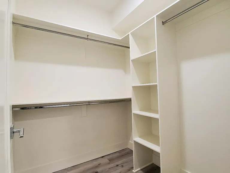 Rear master bedroom walk-in closet