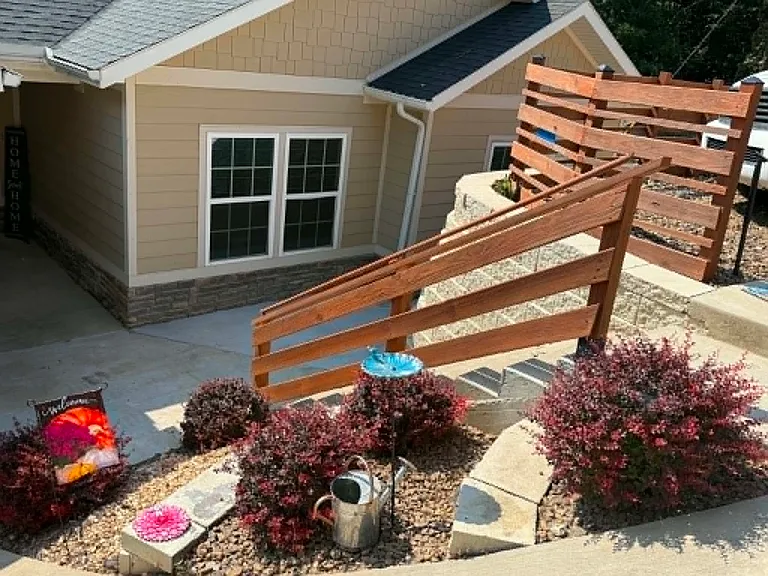 Front exterior

Newly stained posts and railings with updated landscaping