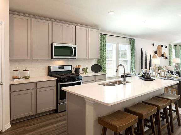 It apos s easy to converse with guests while preparing meals in this spacious, open kitchen.