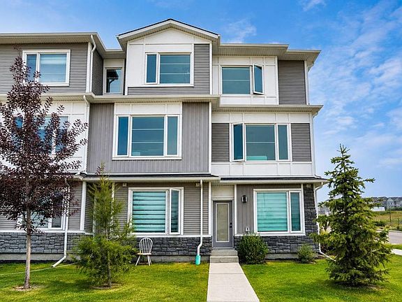 2nd image of 241 W Saddlepeace Cres NE