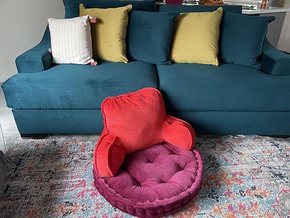 New teal velvet oversized couch with pull-out queen bed. Couch cover provided to protect fabric.