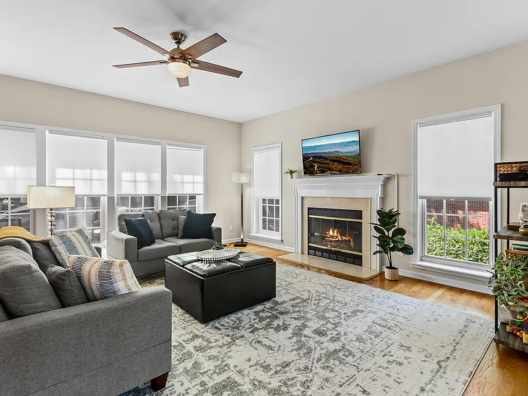 Comfortable living space with flat screen TV and fireplace