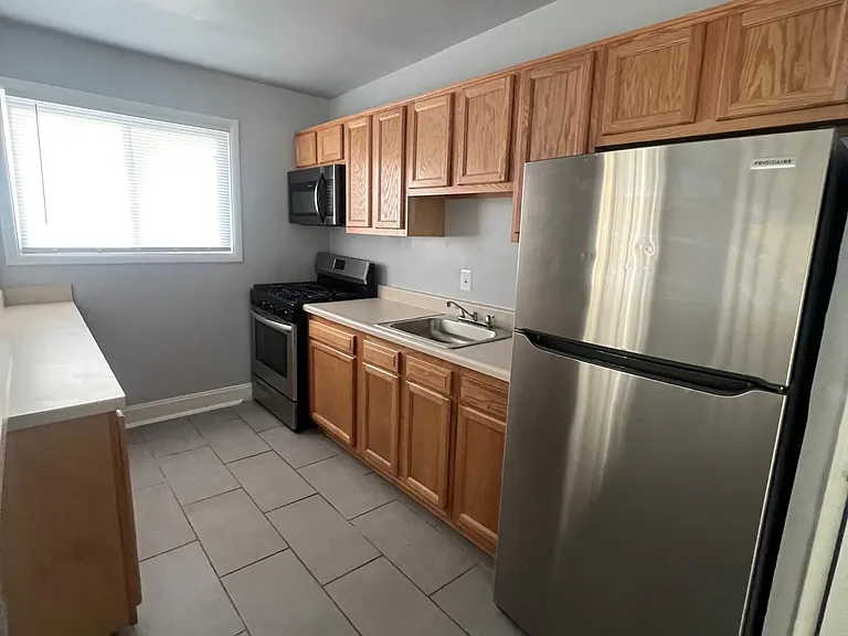 Tudor Place Apartments — Photo 14