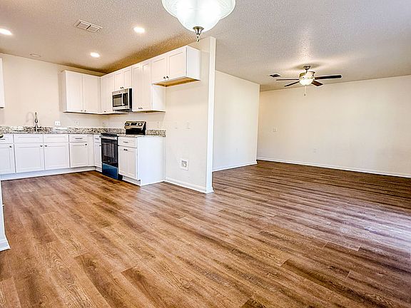 View from dining area. Plenty of room for a large dining room table.