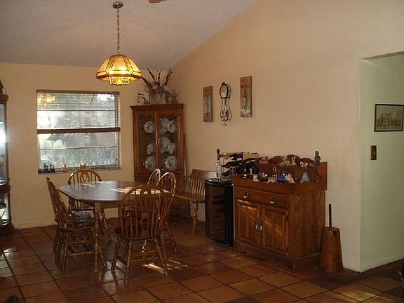 dining room with vaulted ceiling