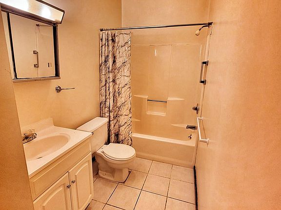 full bathtub and shower