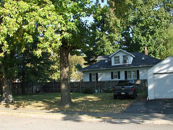View of garage and yard