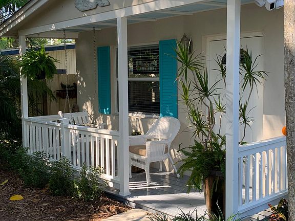 Front porch with swinging chair