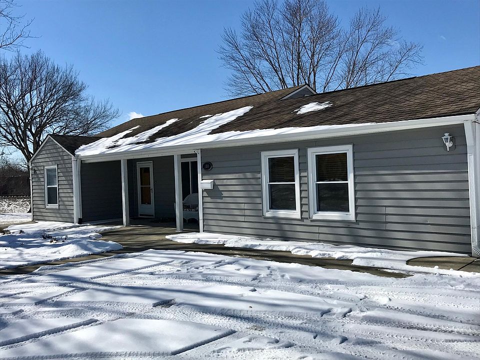 Front View of Home with Ample Concrete Parking
