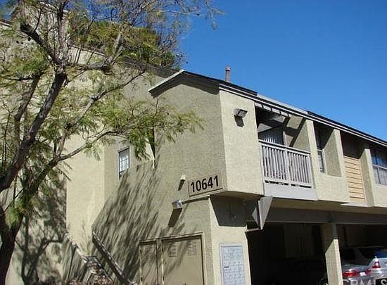 End Unit with Private stairs and Gate! Parking directly belo