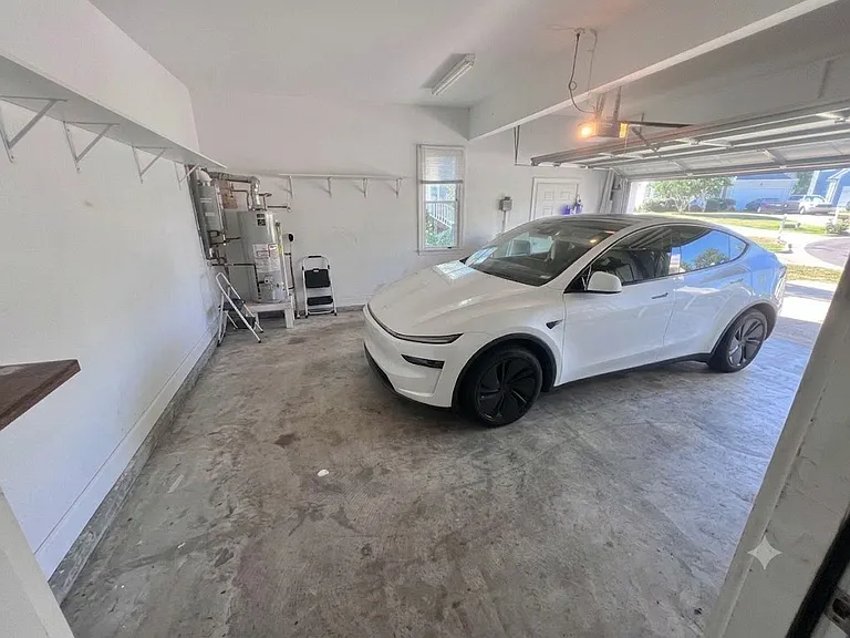 Spacious garage, and Water heater in the garage, no worries of the water leaking from upper floorings