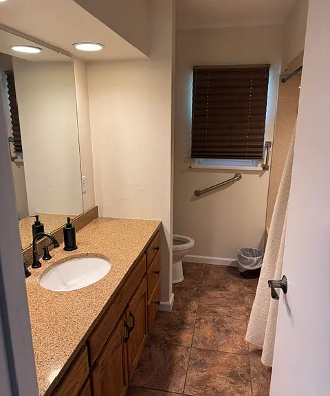 upstairs bathroom with walk in shower